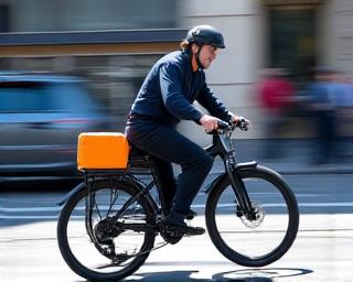 Urban last-mile delivery courier on e-bike in New York City